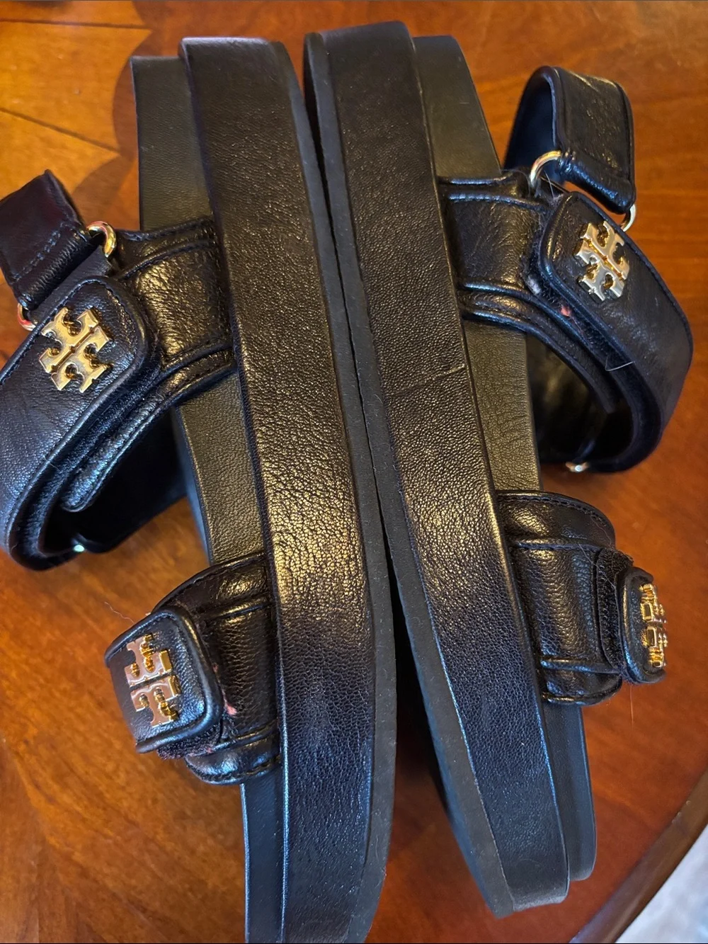 Tory Burch Kira women’s Black Leather Double-Strap Sandals with Gold Logo